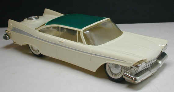 My first car 1959 Plymouth two tone green